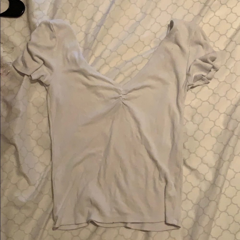 Deep cut white shirt